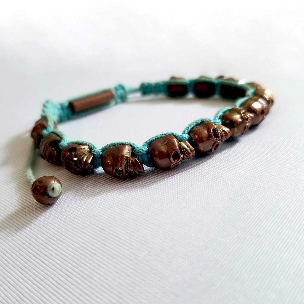 Solid Brass Skull Bracelet Braided with Turquoise Rope